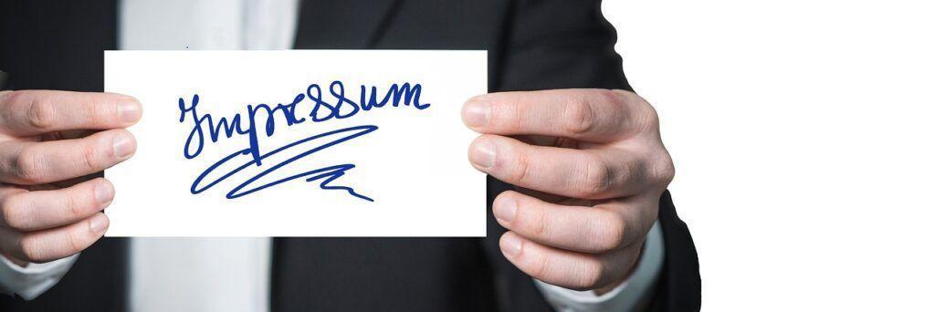 Bild mit handgeschriebenem Wort Impressum